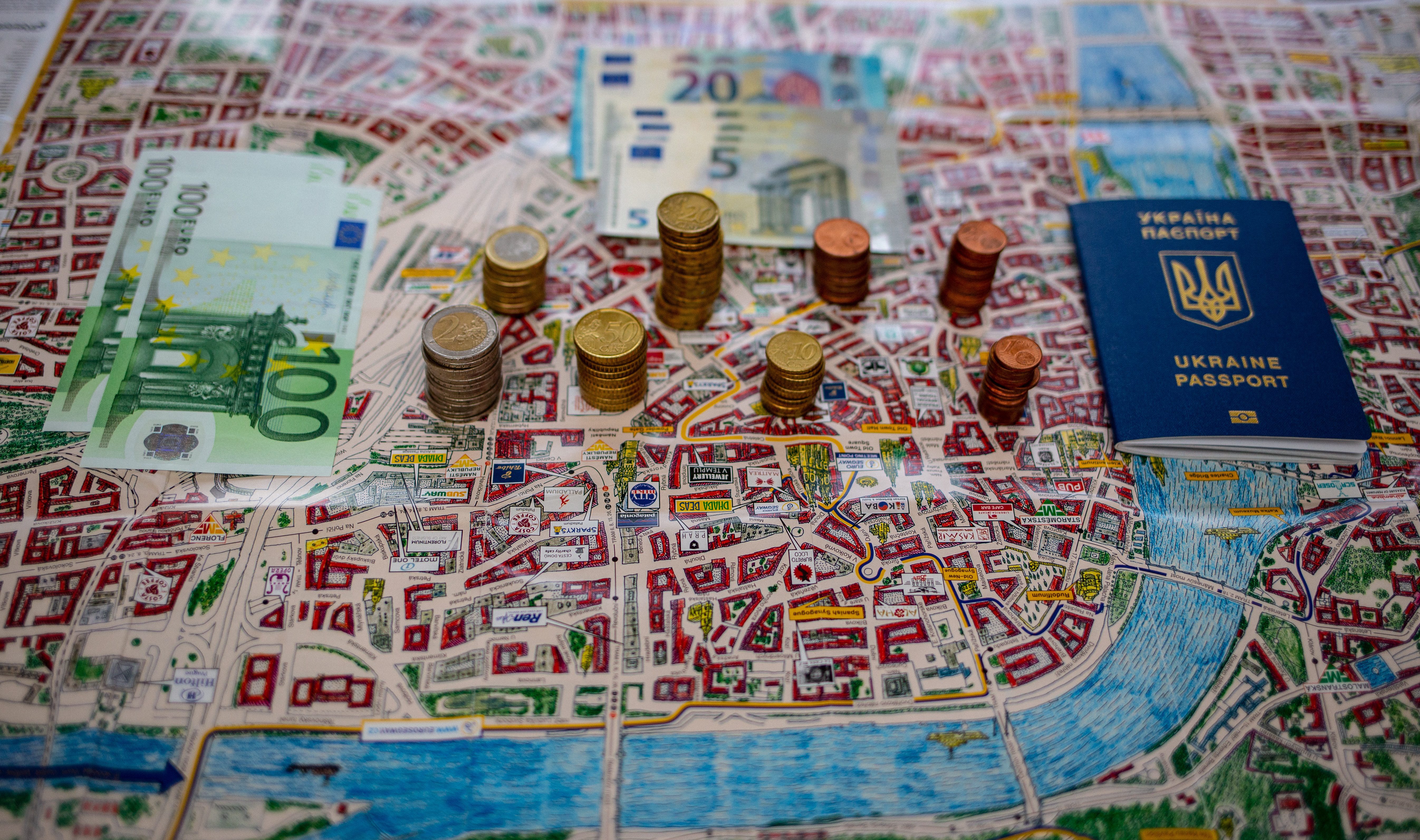 City map with cash and bills